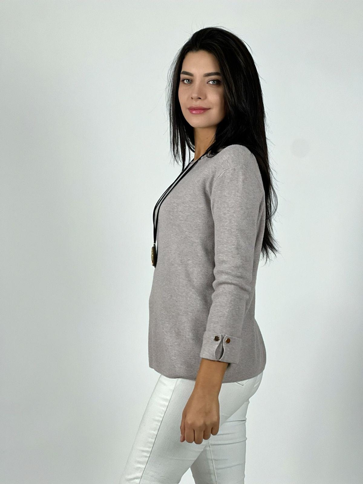 Sweater de lana mangas dobles y botones