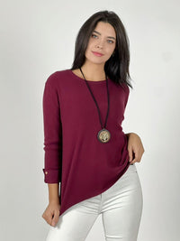 Sweater de lana mangas dobles y botones