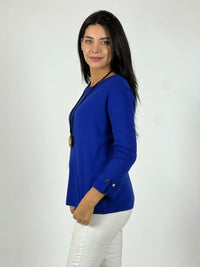 Sweater de lana mangas dobles y botones