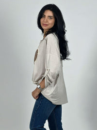 Polera Acetato Corazón Brillante