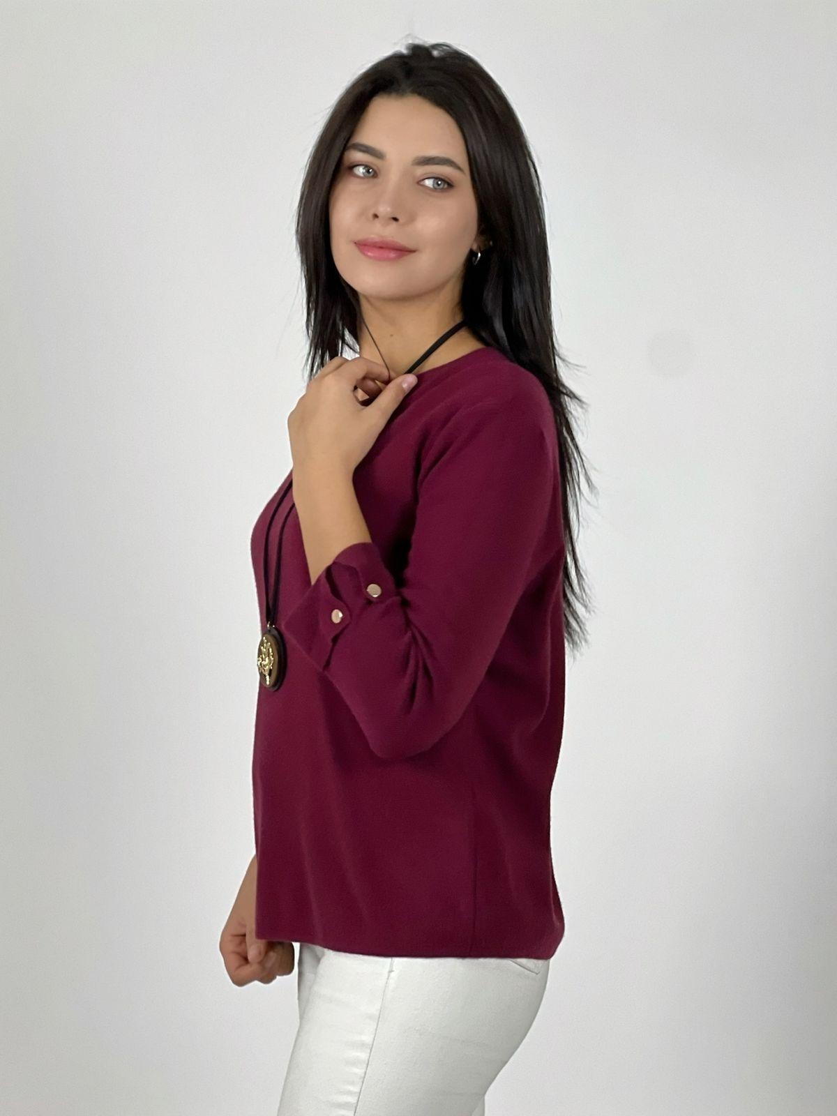 Sweater de lana mangas dobles y botones