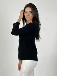 Sweater de lana mangas dobles y botones