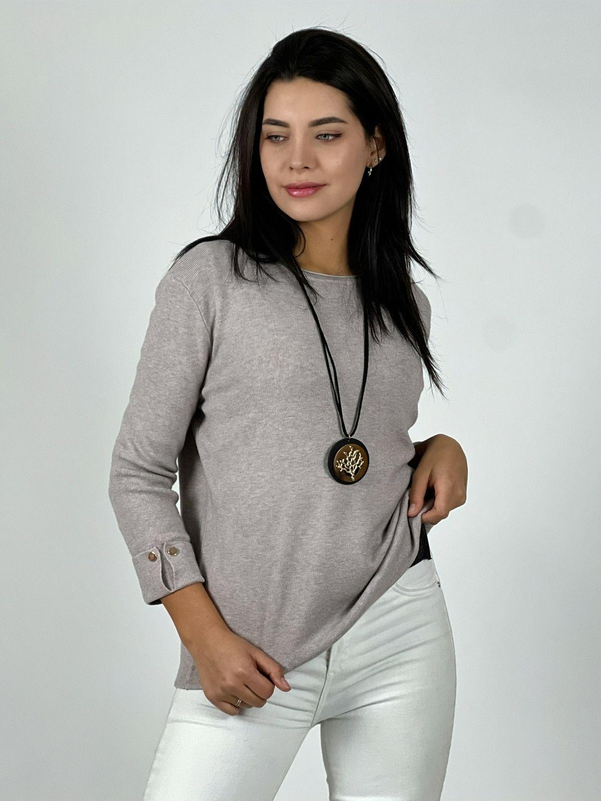 Sweater de lana mangas dobles y botones